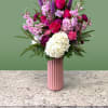 An elegant holiday arrangement that celebrates romance!

Showcasing a purple, white, and pink
