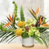 This unique tropical design includes birds of paradise, pin cushion protea, cymbidium