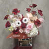 Make a statement that lasts. This premium arrangement features deep crimson and