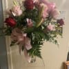 Beautiful bouquet of a dozen, soft, pink and red roses with pink