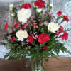 Traditional and classic carnations in a designers choice of Valentine colors. A