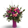 Awestruck is a bold and vibrant arrangement designed to impress, featuring cheerful