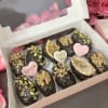 Chocolate covered dates with pistachios, walnuts and dried fruits. Small box holds