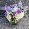 This arrangement is in a 8 inch bubble bowl filled with hydrangeas