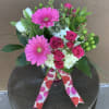 Hydrangea, Gerbera Daisies , spray roses and tulips in a clear ginger