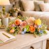 Attracting attention with its vivacious color palette, the bouquet calls upon the