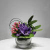 &ldquo;Plum" Cocktail Accent Centerpiece

Introducing Plum, a chic, compact floral design crafted for