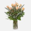 Our long-stem peach roses are expertly arranged by our talented florists with