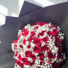 50 fresh red hand-picked roses tied un in bouquet with baby breath