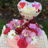 Stunning decorative heart decorated  with premium blooms: roses, orchids, daisies, fancy