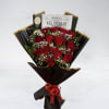 A timeless bouquet of lush red roses, delicately accented with baby&rsquo;s breath