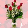 6 roses in vase with greens and babies breath. Perfect for a