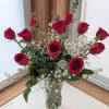 Dozen Red Roses vased with Limonium filler