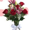 half dozen roses with lilies, greens and babies breath
