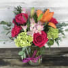 Embrace the feelings of summer lovin' when you send this vibrant-colored arrangement.