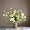 Step into a blooming meadow with this airy and romantic wildflower-inspired centerpiece.