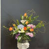 An airy arrangement that feels abundant without shouting, Lizzy is layered with