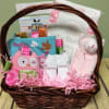 Welcome your new little lady with this gift filled with unique baby