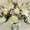 Mostly white blooms with touches of pastel hues that are soft and