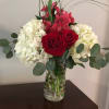 White hydrangea and red roses never fail to please!