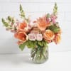 A stunning variety of lilies, snaps and roses in an array of