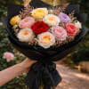 A breathtaking bouquet of a dozen garden roses, thoughtfully arranged to showcase