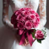 This vibrant set features a bridal bouquet of stunning, hot pink roses