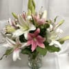 A beautiful arrangement of pink and white lilies. Simply gorgeous!