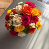 Sending this fun arrangement of roses and button pompons is sure to