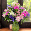 This bouquet will surprise with its' size! Composed of alstroemeria, dianthus, and