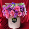 Small graduation flower box . 
Includes roses and additional fillers. 
Box color