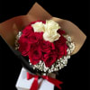 19 red roses that surround 3 white roses in the middle wrapped