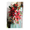 A beautiful standing spray with vibrant red hues.

Flower selection subject to availability.

***Prices