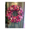 A beautiful and elegant European-style wreath with mixed flowers on an easel.

*Picture