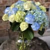 This beautiful custom designed floral arrangement by Wonderland Flowers is perfect for