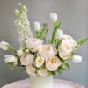  An elegant all white floral piece, elevate any space with the