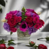 Vibrant Romance is romantic, and full of charm! Featuring vibrant fuchsia anemones