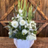 Gorgeous collection of white flowers in a white box.  Very statuesque