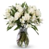 Vase of white roses with some Alstroemeria around.