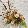 Modern, earthy, warm and exotic floral arrangements.