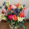 A vibrant mix of colors and textures makes this arrangement the perfect