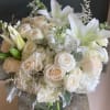 Variety of white premium flowers in short vase