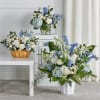 Featuring soothing tones of blue and white, the traditional arrangements of this