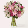 Blooming and bold, this bubbly arrangement is an effortless way to share