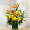 This unique design includes birds of paradise, cymbidium orchids, pin cushion protea