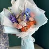 Cute ocean blue floral mix . Handheld bouquet , you may request