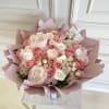 Peonies 
Hermosa Roses 
Hydrangeas 
Rice 
Mini roses 

*This bouquet does not include