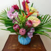 Make jaws drop with this display of bold and exotic Tropical Flowers.