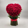 This arrangement is a breathtaking statement of love, featuring dozens of perfectly