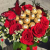 Glass Vase Arrangement may included Red Roses, wax- flower, green foliage and